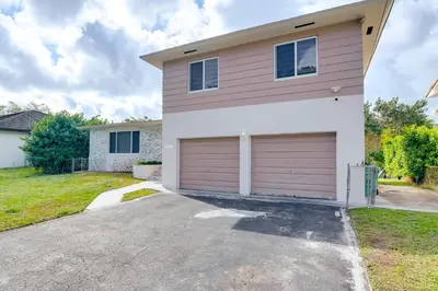 a large house with a garage at 8 Mi to Wynwood Waterfront Retreat with Lanai in Miami