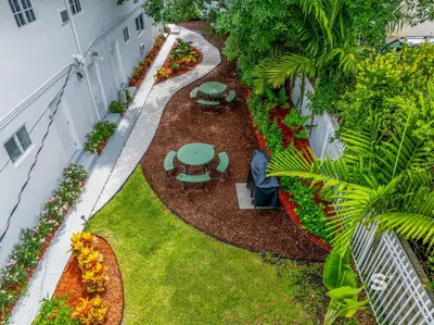 an overhead view of a garden with tables and flowers at Cozy 1-BD Miami Apt Gym, BBQ, Free Parking in Miami