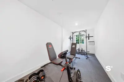 a gym with bikes parked in a room at Chic 1-BD Apt in Miami Gym, BBQ, Free Parking in Miami