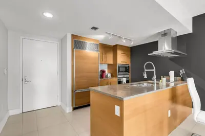 a kitchen with a counter and a sink in it at Icon brickell 1 bed 1 bath residence in Miami