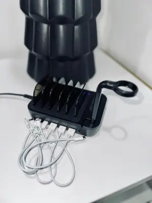 a black hair dryer sitting on top of a table at Modern Home with large private yard - Next to downtown & beach & airport - Pet friendly in Fort Lauderdale