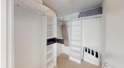 a walk in closet with white walls and a door at Hyde Beach House 3BR2BA in Hollywood