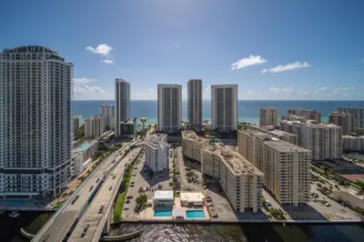 an aerial view of a city with tall buildings at Hallandale Beach Apmt 1B1B with Beach Service & Pool Service in Hallandale Beach