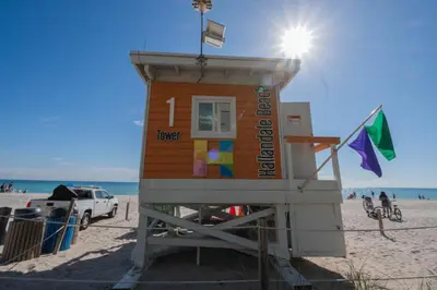 a lifeguard tower on the beach with a truck at Beach Apt Full kitchen and King size bed in Hallandale Beach