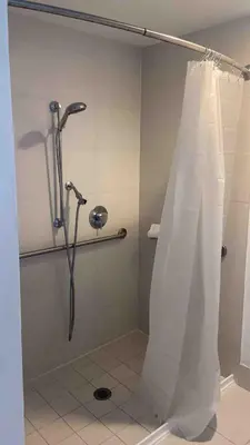 a shower with a shower curtain in a bathroom at Miami Beach 1B 1B Incredible View Apt with Kitchen in Hallandale Beach