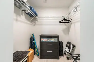 a room with a tv in a room with a wall at New 2br 2bath 5 mins from beach 15 mins airport in Hallandale Beach