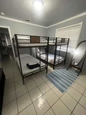 a room with two bunk beds and a window at Mighty Miami - Private Room 6 Beds in Miami