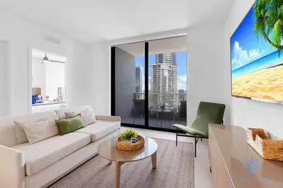 a living room with a couch and a table at Modern Stylish 1BR Apartment with Pool in Miami