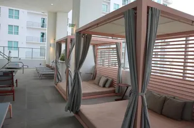 a room with a canopy bed in a building at Modern Luxe Studio in Downtown Miami with Rooftop Pool and Gym in Miami