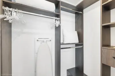 a bathroom with a glass door with a towel rack at Modern Luxe Studio in Downtown Miami with Rooftop Pool and Gym in Miami