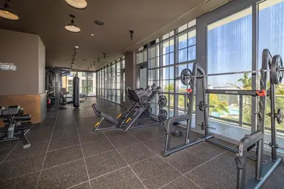 a gym with cardio equipment in a building at Exquisite 2 Bedroom in the best location of Downtown Miami in Miami