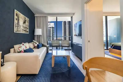 a living room with a couch and a table at Exquisite 2 Bedroom in the best location of Downtown Miami in Miami