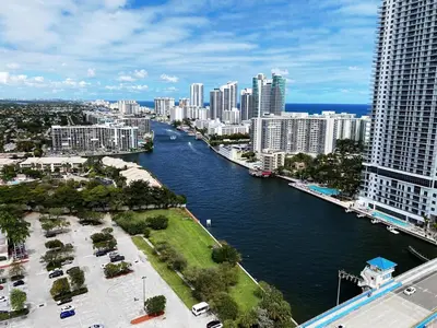 a view of a river in a city with tall buildings at Apartment in Miami Beach with Kitchen, Beach Service and Gym in Hallandale Beach