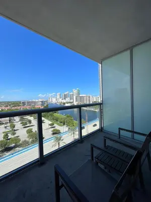 a balcony with a view of the beach and buildings at Beautiful studio in Beachwalk 2QB in Hallandale Beach