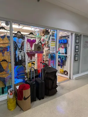 a room with luggage and bags in a store at Castle beach studio,tennis court and swimming pool with beach access in Miami Beach