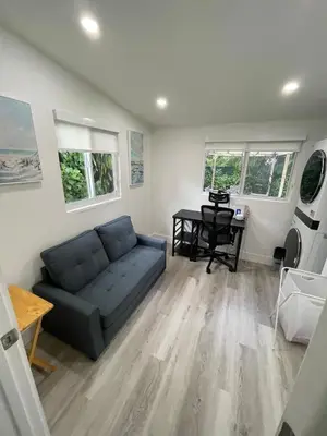 a living room with a couch and a table at Beautiful House in Coral Gables FL in Miami