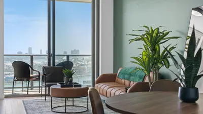 a living room with a couch and chairs and a table at 2-Bedr Downtown Miami Condo Bay Views in Miami