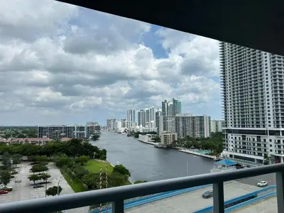 a view of a river in a city with buildings at Cozy 1BR Retreat wPool BeachService & Full Kitchen in Hallandale Beach