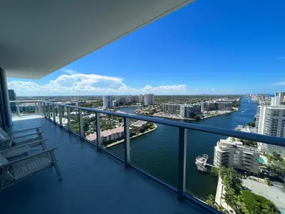 a balcony with a view of a river and buildings at Best Apartment next to Hollywood Beach 2B 2B in Hollywood