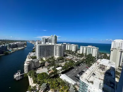 an aerial view of a city with a river and buildings at Best Apartment next to Hollywood Beach 2B 2B in Hollywood