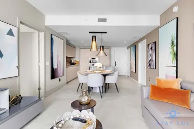 a living room with a couch and a table at Bay View 2Br Apartment with Amenities in Hollywood