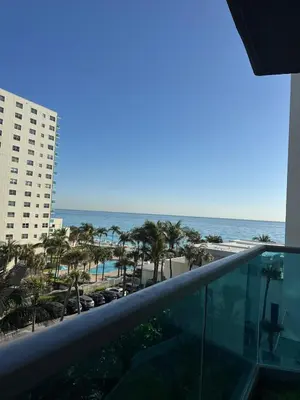 a view of the ocean from the balcony of a resort at beautiful place 1 in Hollywood