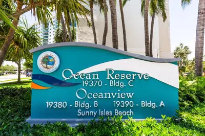 a sign for an ocean reserve big c oceanview sign at Modern Apartments Ocean Reserve Sunny Isles Beach in Sunny Isles Beach