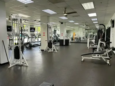 a gym with several treadmills and machines at Modern Apartments Ocean Reserve Sunny Isles Beach in Sunny Isles Beach