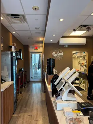 a restaurant with a counter with white chairs at Modern Apartments Ocean Reserve Sunny Isles Beach in Sunny Isles Beach