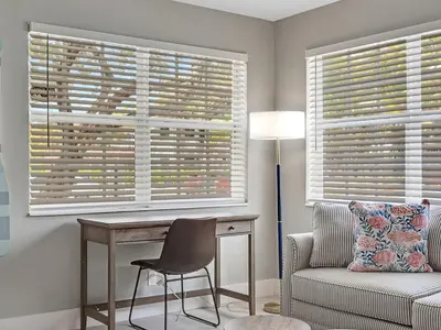 a room with a desk and a chair and windows at Hollywood Beach 1BR Getaway | WiFi + AC in Dania Beach