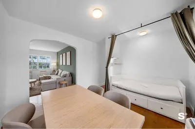 a room with a bed and a table and chairs at Modern 1-BD Apt with Free Parking in Miami Beach