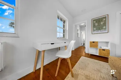 a white desk with a white chair in a room at Modern 1-BD Apt with Free Parking in Miami Beach