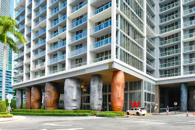 a large white building with large objects on it at Luxury Miami Condo with Breathtaking City & Bay Views in Miami
