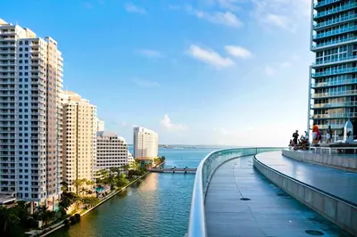 a bridge over a river in a city with buildings at Luxury Miami Condo with Breathtaking City & Bay Views in Miami