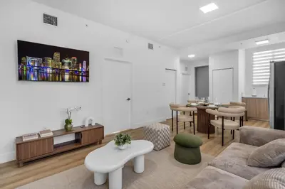 a living room with a couch and a table at #206 Brand-New 2BR- 2BA Near Brickell in Miami