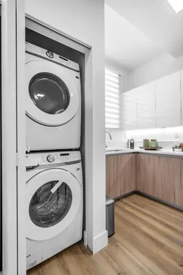 a laundry room with a washer and dryer at #206 Brand-New 2BR- 2BA Near Brickell in Miami