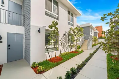 a house with a walkway in front of it at #208 Brand New 2BR -2BA near marlins stadium in Miami