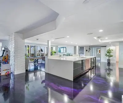 a large kitchen with a sink and a counter at Luxury 3-Bedroom Bayview Retreat at The Grand Miami in Miami
