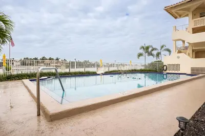 a swimming pool in the middle of a building at The Blue Octopus - 1br King Bed Condo in Fort Lauderdale