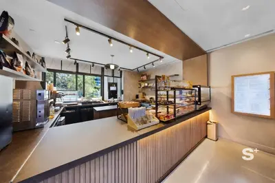 a large kitchen with a counter with food on it at 1-BD Condo in DTW Miami - City Views in Miami