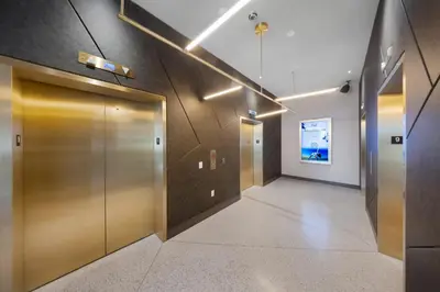 a hallway with two elevators in a building at Modern Downtown Studio with city views in Miami
