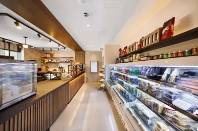 a store aisle of a grocery store with food at Modern Downtown Studio with city views in Miami