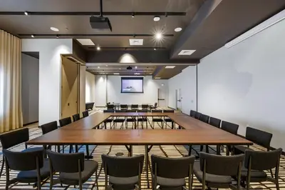 a large conference room with a large table and chairs at 3005 golden305 2BR Apt mins to Wynwood and Brickell w Pool a Gym and PS5 in Miami