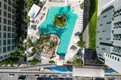 an aerial view of a resort with a swimming pool at 3610 Calm Blue Studio w Balcony View Pool and Gym in Miami