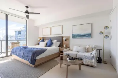 a bedroom with a bed and a couch at 3012 Studio in front of Kaseya Center with Pool in Miami