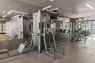 a gym with a bunch of machines in a room at 3209 Apt in Heart of Downtown with Pool a Gym and Spa in Miami
