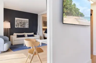 a living room with a view of the beach at 2012 New Apt with Pool and Gym in front of Kaseya Center in Miami