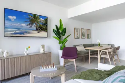 a living room with a couch and a table at 3013 Kaseya Center Apt for 4 people with Pool and Gym in Miami