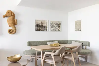 a dining room with a table and a seahorse on the wall at 2409 Apt in Downtown Miami with Gym and in front of Kaseya Center in Miami