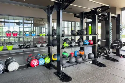 a room with shelves filled with different colored helmets at 2409 Apt in Downtown Miami with Gym and in front of Kaseya Center in Miami